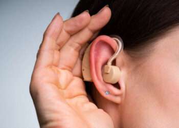 How do I care for my hearing aids in the summer?