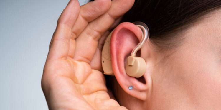 How do I care for my hearing aids in the summer?